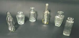 Clear glass embossed small bud vases Set/6 sizes between 4 “-7”
