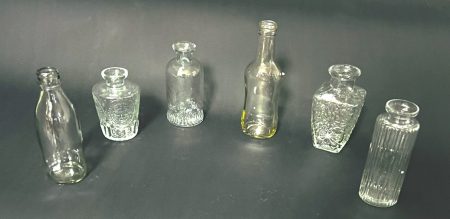 Clear glass embossed small bud vases Set/6 sizes between 4 “-7”